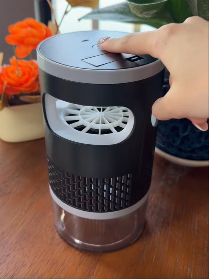 Customer turning on the insect trap